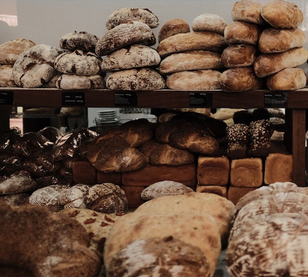 bread stacked up in a bakery