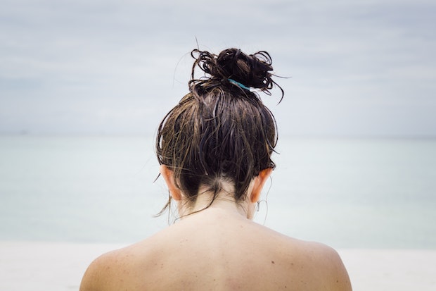 a photo of a woman’s upper back